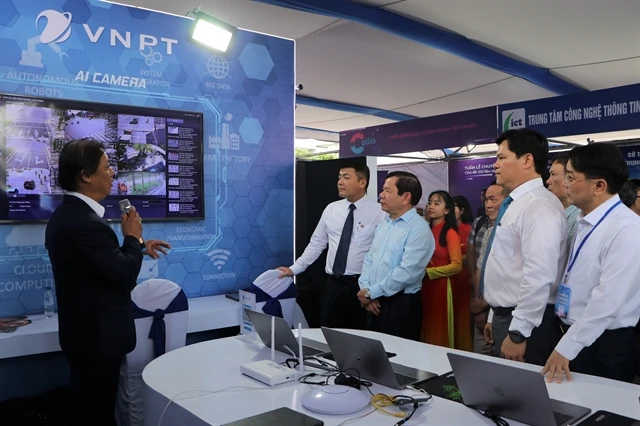 A booth of a digital technology enterprise displays products and technology solutions. The draft Law on Digital Technology Industry will create a legal framework to promote the development of the industry. (Photo: VNA)